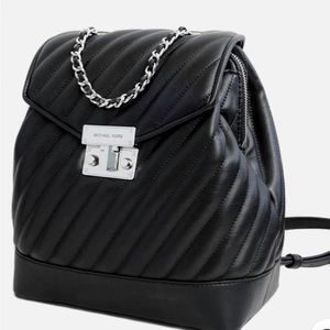 MICHAEL KORS Rose Medium Chain Backpack Purse
MSRP $628.00